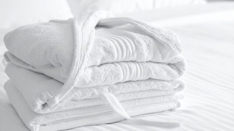 Fresh white linen prepared for commercial use